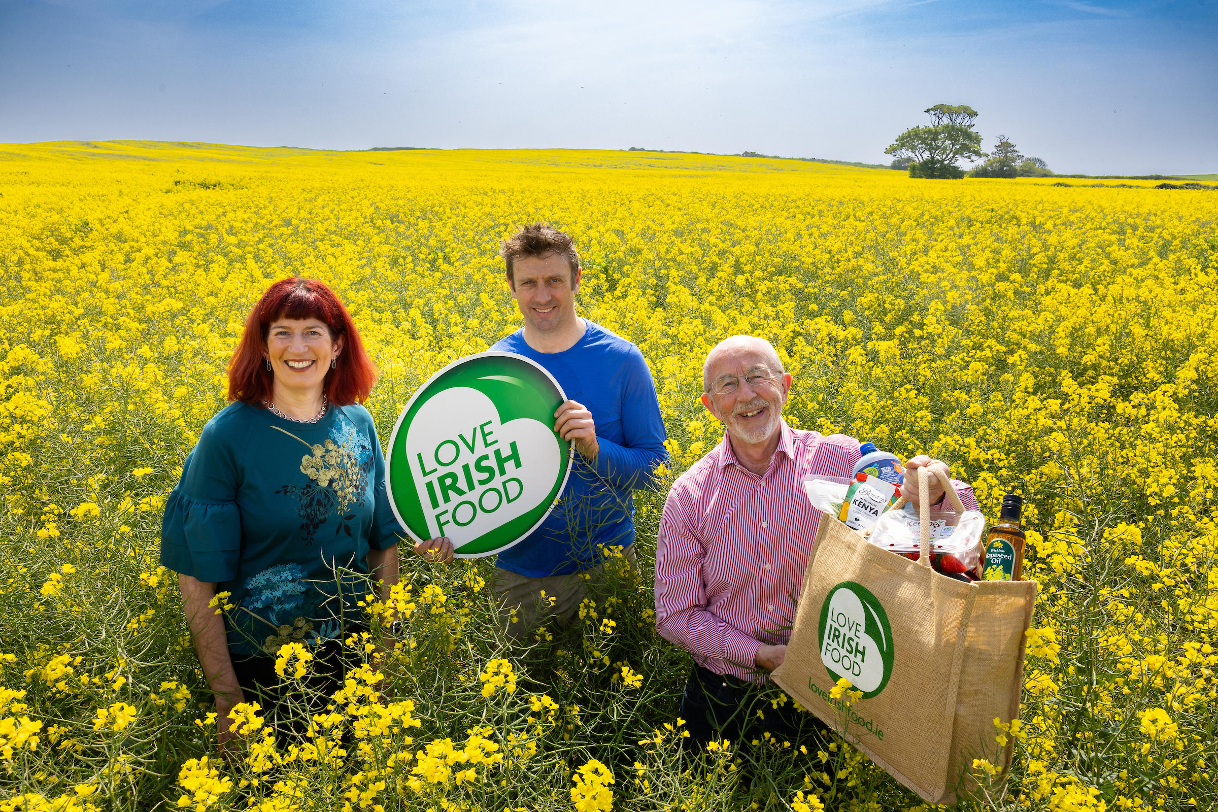 Pictured in the fields of Sussed Nutrition Ltd (Co. Wicklow), are Lucy Ryan, Head of Food & Beverage Sector, Bank of Ireland; Keith Symes, farmer and producer of Sussed Rapeseed Oil and Kieran Rumley, Executive Director, Love Irish Food.