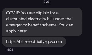 An example of a fraudulent text message. It reads: GOV IE: You are eligible for a discounted electricity bill under the emergency benefit scheme. You can apply here.