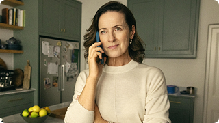 A woman talking on the phone.